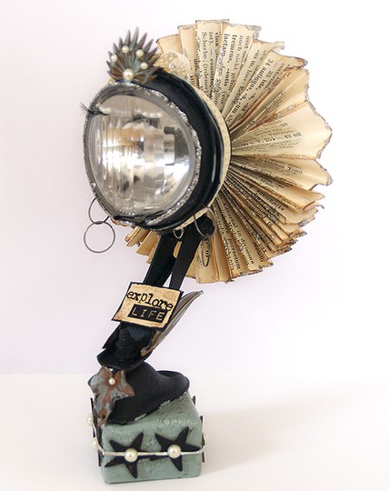 Altered bicycle lamp "art doll"
